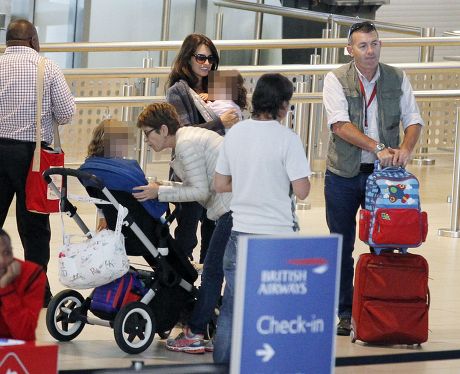 Penelope Cruz and her children at Cape Town International Airport, South Africa - 15 Oct 2014