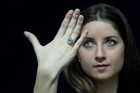 Press Officer Sarah Gubbins Wearing A Cushion Shaped Diamond Single-stoned Ring Weighing 14.07 Carats Estimated To Sell For Ii330 000-ii460 000- Jewels From The Collection Of Author Barbara Taylor Bradford To Be Auctioned At Bonhams New Bond Street O