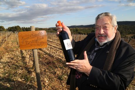 French comedian Jean-Claude Dreyfus presents his vineyard plot in Aigues-Vives, France - 14 Jan 2015