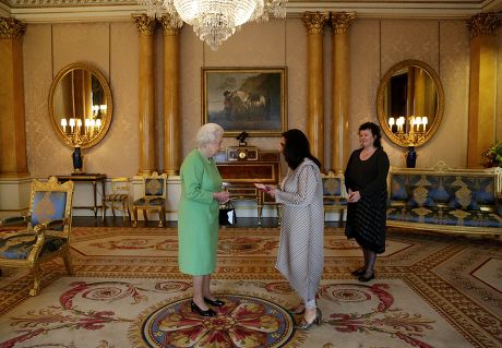 Queen Elizabeth II presents Imtiaz Dharker with The Queen's Gold Medal for Poetry at Buckingham Palace, London - 12 Feb 2015