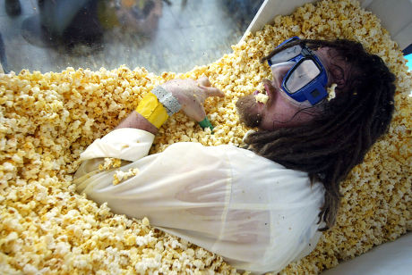 COMPETITIVE EATER BURIED ALIVE IN 'POPCORN SARCOPHAGUS', NEW YORK, AMERICA - 04 MAY 2004