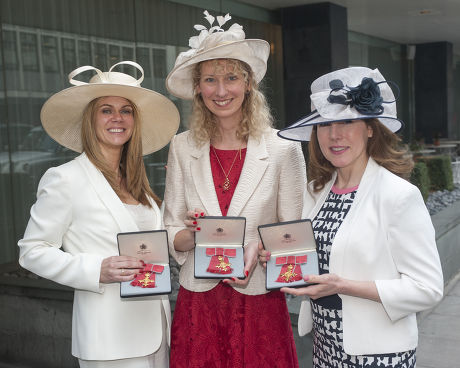 Founders Of Netmums.com Who Received An O.b.e. From The Duke Of Cambridge At Buckingham Palace. L-r Siobhan Freegard Age 46(white Suit) From Harrow Sally Russell Age 47( Red Dress) From Watfordand And Catherine Court Age 47 ( Black And White Dress) F