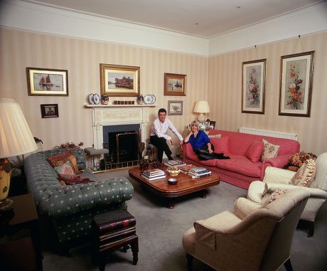 JOHN STAPLETON AND WIFE AT HOME