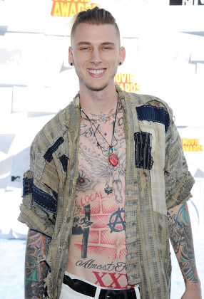 1 Mgk chest tattoos Stock Pictures, Editorial Images and Stock Photos ...