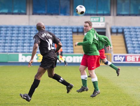 Prostate Cancer Uk Charity Football Match At Millwall Football Club. The Teams Where 'men Utd' Vs Ukpfc . Ian Murray Mp With Luther Blissett.