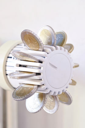 Euro Coins Sticking Out Thermostatic Valve Editorial Stock Photo