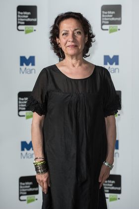 Author Hoda Barakat poses during a photo-shoot before the announcement of the 2015 Man Booker Prize winner at the Victoria and Albert Museum.