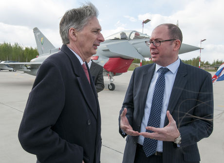 Secretary Of State For Defence Phillip Hammond With British Ambassador To Lithuania David Hunt At The Siauliai Air Force Base In Lithuania Where Four Raf Tornado Aircraft Have Been Stationed. Picture David Parker 02.5.14 Reporter Ian Drury.