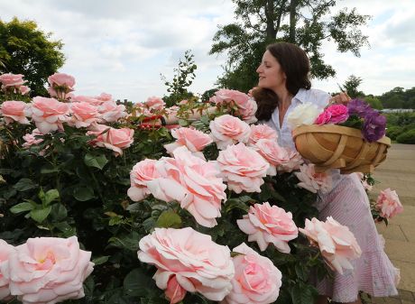 Staff member Emma Pike in the rose garden