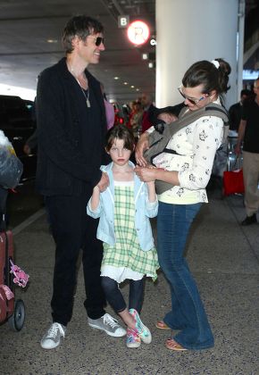 Milla Jovovich and family arrive at LAX Airport, Los Angeles, America - 19 Jun 2015