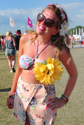 A General View Of Day Two Of The Isle Of Wight Festival. Sunburnt Fan Chloe Smith 24 From Bristol.