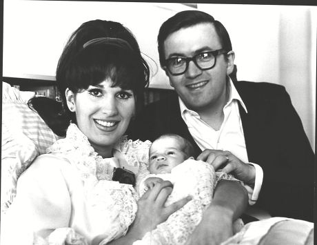 Actress Yvonne Romain With Her Husband Leslie Bricusse (composer Lyricist Playwright) With Their Baby In Queen Charlotte's Hospital. Box 0576 050615 00160a.jpg.
