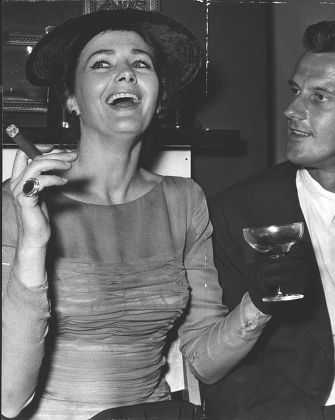 Vivienne Drummond Actress Smoking A Cigar And Drinking Champagne At The Wedding Reception Of John Osborne. Box 0586 150615 00149a.jpg.