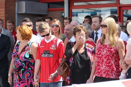 One minute silence for Walsall football fans Joel Richards, Adrian Evans and Charles 'Pat' Evans who were killed in Tunisia, Walsall, Britain - 03 Jul 2015