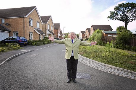 Buy To Let Property Millionaire Fergus Wilson Outside Seven Of His Properties In Asford For David Jones Interview.