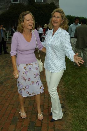 Anne Hearst (left) and Kathy Hilton at the cocktail reception for "A Toast For A Child", benefiting Operation Smile at the home of Rick & Kathy Hilton in Southampton, New York on July 27, 2002.

Southampton, New York

Photo® Matt Baron/BEImages.net