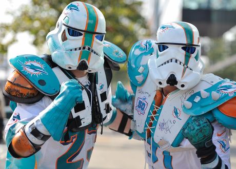 Miami Dolphins footbal fans dressed as Stormtroopers posing for a