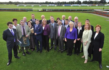Ukip Annual Party Conference At Doncaster Racecourse South Yorkshire. Pic Shows:- Ukip Leader Nigel Farage Poses For A Group Photograph With His Ukip Mep's At Doncaster Racecourse. (l-r):- Gerrard Batten Diane James David Coburn Paul Nuttall Margo P