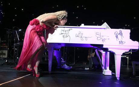 Miley Cyrus Licking Piano Editorial Stock Photo - Stock Image