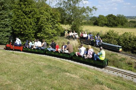 Miniature Trains Carrying Passengers Through Countryside Editorial ...