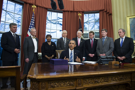 US President Barack Obama signs H.R. 644, Trade Facilitation and Enforcement Act of 2015 at the White House, Washington DC, America - 24 Feb 2016