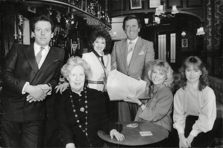 Terry Wogan Joins The Cast Of Eastenders For The First Birthday At Elstree Studios. L-r: Leslie Grantham Anna Wing Anita Dobson Terry Wogan Wendy Richard And Susan Tully. Box 631 830091510 A.jpg.