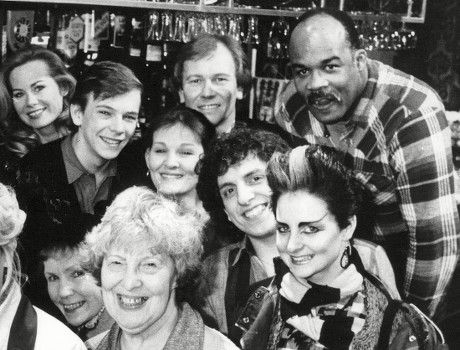 Authoress Jilly Cooper With The Cast Of Eastenders. Back Row L-r: Peter Dean Leslie Grantham Anita Dobson Unknown Jilly Cooper Unknown Shirley Cheriton Adam Woodyatt (the Rest Unknown). Front Row L-r: Bill Treacher Wendy Richard And Anna Wing. (for F