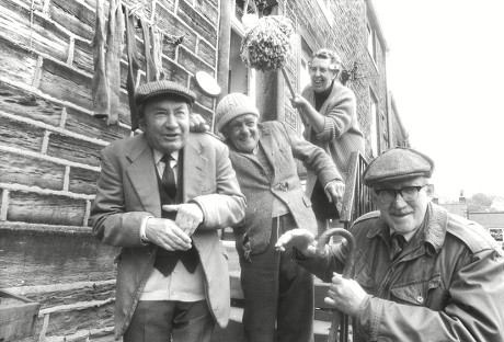 Tv Programme: Last Of The Summer Wine. Nora Batty (kathy Staff) Waving Her Mop At L-r: Clegg (peter Sallis) Compo (bill Owen) And Foggy (brian Wilde). Box 650 404121516 A.jpg.