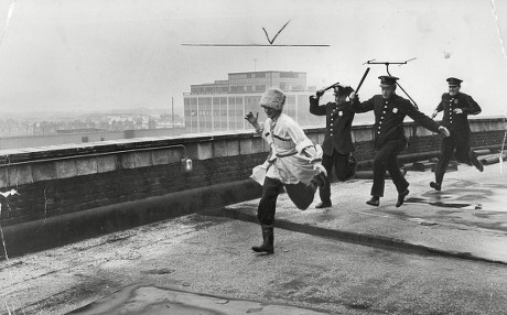 Alexei Jourdoicimar (playing Yessenin Husband Of Isadora Duncan) Being Chased By Three New York Policemen Played By Les White Billy Dean And 'nosher' Powell Across The Balcony Of The Royal Albert Hall For A Bbc Film About Ballet Dancer Isadora Dunc