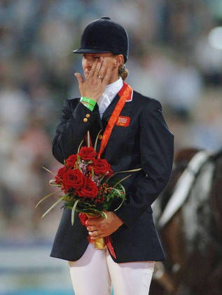 Medal Presentaion : Kristina Cook (Great Britain) wipes away a tear after celebrating her Bronze Medal Equestrian event Shatin Hong Kong Beijing Olympics 2008 12/8/2008 She is the daughter of Horse racing trainer Josh Gifford