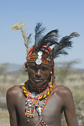 Young Masai Man Wearing Ostrich Feathers Editorial Stock Photo - Stock 