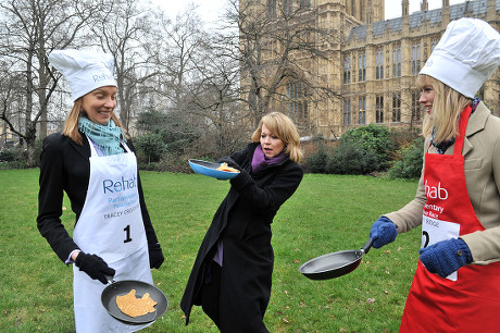 Shrove Tuesday Charity Pancake Race with Mps and Lords Joined by Media in A Race to the Finish. in Aid of Rehab