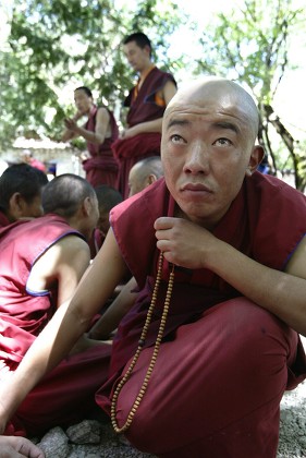 Tibetan Monk Listens During Scripture Debates Editorial Stock Photo ...