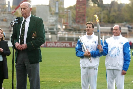 Former Australian Olympian John Landy Speaks As Present and Past Olympians Matt Welsh and Herb Elliot, Holding the Olympic Torch, Look On - Jun 2004
