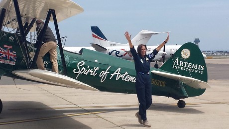 Tracey Curtis - taylor Lands Her Restored 1942 Boeing Stearman Spirit of Artemis at Sydney International Airport - Jan 2016