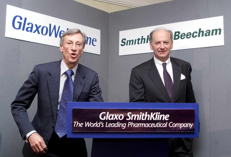 London United Kingdom : Sir Richard Sykes (left) Chairman of Glaxo Wellcome and Jean-pierre Garnier Chief Executive Officer Elect of Smithkline Beecham at a Photo Call 17 January 2000 at the Brewery City of London For the Proposed 15 Billion Pound (24 9 Billion Usd) Merger of the Two Research-based Pharmaceutical Companies