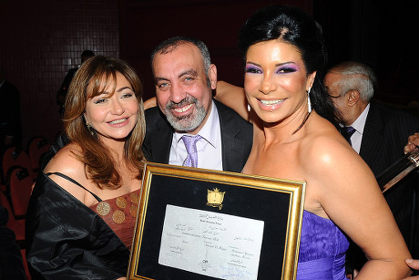 Egyptian Actress Laila Alawi (l) Egyptian Film Director Khaled El Hagar (c) and Egyptian Actress Sawsan Badr Pose For a Photograph During the Closing Ceremony of the 34th Cairo International Film Festival (ciff) at the Opera House in Cairo Egypt 09 December 2010 the 34th Cairo Film Festival Takes Place From 30 November to 09 December 2010 and Focuses on Both Arab and International Cinema Egypt Cairo