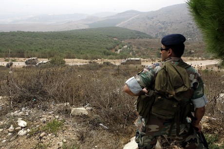 Lebanese Soldier Watches Israeli Military Vehicles Editorial Stock ...