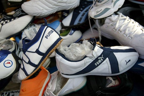 Tigre estante Sociología Copies Puma Shoes Imported China Sale - Foto de stock de contenido  editorial: imagen de stock | Shutterstock