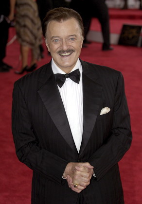 Performer Robert Goulet Poses On Red Editorial Stock Photo - Stock