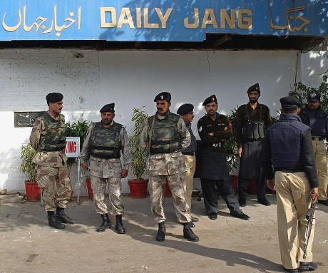 Pakistani Law Enforcement Officials Stands Outside Editorial Stock