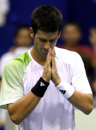 Novak Djokovic of Serbia Greets the Crowd in Thai Tradition After Defeating Simon Stadler of Germany During Their Second Round Match of the Atp Thailand Open Tennis Tournament 2008 at the Impact Arena in Bangkok Thailand 25 September 2008 Djokovic Won Stadler 6-1 6-3