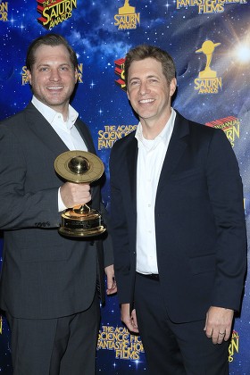 Us Producers/writers Aaron Helbing(l) Todd Helbing Pose with Their Award at the 42nd Annual Saturn Awards Held at the Castaway in Burbank California Usa 22 June 2016 the Saturn Awards Honors the Best in Science Fiction Fantasy Horror and Other Genres in Film Television Home Media Releases and Theatre United States Burbank
