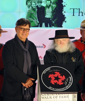 Canadian Rock Musicians Robbie Robertson (l) and Garth Hudson Surviving Members of the Band Are Inducted Into Canada's Walk of Fame in Toronto Canada 18 October 2014 the 17th Annual Walk of Fame Celebrates Canadians who Have Achieved Excellence in Music Film Television Literature Visual and Performing Arts Sports Science and Innovation Canada Toronto