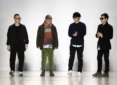 (l-r) Concept Korea Designers Kaal E Suktae Choi Boko Tae-young Ko and Park Youn Soo Appear on the Catwalk at the Conclusion of Their Show During Mercedes-benz Fashion Week in New York New York Usa 11 February 2014 the Fall Winter 2014 Collections Are Presented From 06 to 13 February United States New York