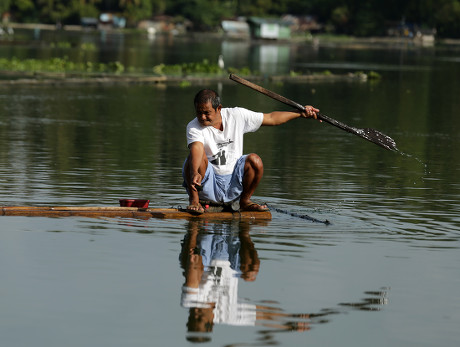 Filipino Fisherman Riding On Makeshift Raft Editorial Stock Photo ...