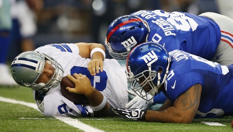 Photo: Dallas Cowboys Tony Romo is sacked by New York Giants Jason