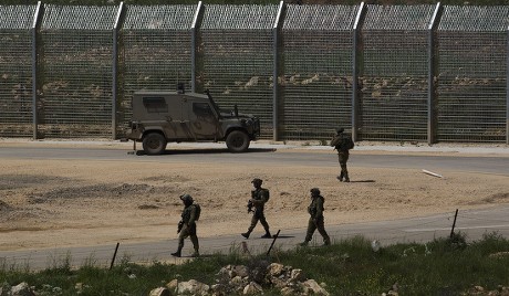 Israeli Soldiers Patrolling Along Israelisyrian Border Editorial Stock ...