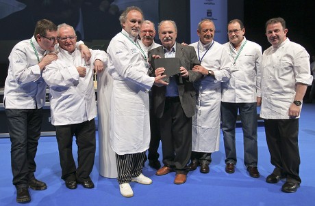 Spanish Chefs Martin Berasategi (r) Hilario Arbelaitz (2r) Karlos Arguinano (3r) Andoni Luis Aduriz (l) Juan Mari Arzak (2l) Ramon Roteta (3l) and Pedro Subjijana (4l) Pose with Luis Irizar (4r) During a Tribute to Irizar on the Occasion of the 13th San Sebastian Gastronomika Fair Held in San Sebastian Spain 21 November 2011 Continuing in the Direction Established at Last Years Edition of the Convention This Thirteenth Installment of the Event Will Present an Original Diverse Program with a Variety of Formats an Eclectic International Vision and an Extensive Look at the World of Gastronomy Exploring It in All Its Diverse Wealth Spain San Sebastian
