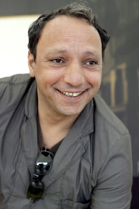 Morocco Born Film Director Hiner Saleem Poses During a Photocall Prior to the Presentation of His Film 'Sous Les Toits De Paris' (beneath the Roofs of Paris) at the 60th International Film Festival Locarno 09 August 2007 in Locarno Switzerland Switzerland Schweiz Suisse Locarno